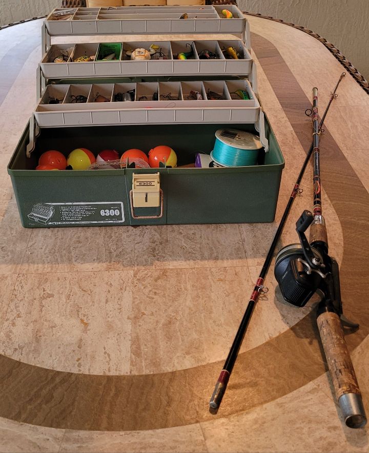 Fishing Pole/Reel and Tackle Box with assorted fishing equipment