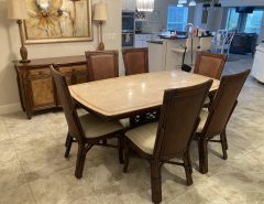 Beautiful dining room table and chairs with matching buffet table The Villages Florida