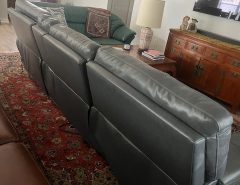 Three piece leather reclining sectional The Villages Florida