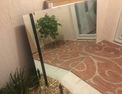 2 bathroom plate glass mirrors and wood medicine cabinet. The Villages Florida