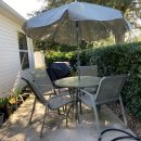 Outdoor dining table, chairs & umbrella The Villages Florida
