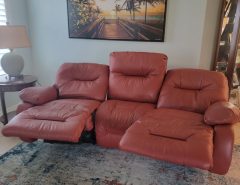 REDUCED $775.  Reclining Leather Sofa Power The Villages Florida