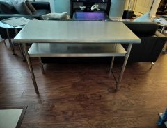 Stainless steel table with shelf  49.5″ long, 24″ wide, 34″ high The Villages Florida