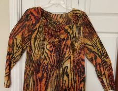 Ladies XL long sleeve, light weight blouse, new with tags….$5. The Villages Florida