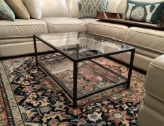 Grey metal table with lower shelf, tempered glass The Villages Florida