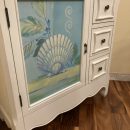 PRICE DROP – MOVING!  Seashell Storage Cabinet The Villages Florida