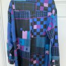 Mens size Large 100% silk shirt, washable.  Beautiful colors lowered price to $5. The Villages Florida