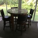 high top table,40″round,36″high,2″thick,with 4 padded stools. The Villages Florida