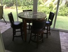 high top table,40″round,36″high,2″thick,with 4 padded stools. The Villages Florida