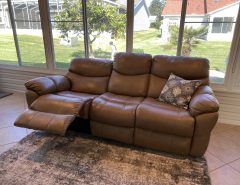 Gold couch 7 feet long recliners on both ends electrical   Like new! The Villages Florida