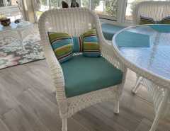 indoor/outdoor white wicker dining set with custom cushions and pillows The Villages Florida