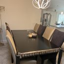 UPSCALE DININGVL ROOM TABLE WITH 8 TUXEDO CHAIRS The Villages Florida