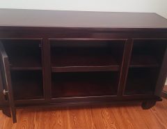 TV entertainment center with 2 cabinets that opened see the photos. The Villages Florida