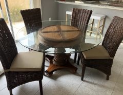 Round topped glass dining table and 4 chairs The Villages Florida