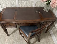 Dark walnut desk 60” X 28” with chair The Villages Florida