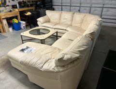 Used Beige Natuzzi Leather Sectional Sofa with used Glass Coffee Table The Villages Florida