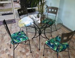 Glass table four chairs The Villages Florida