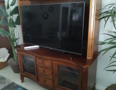 Two-piece Entertainment Center. Medium Brown Wood The Villages Florida