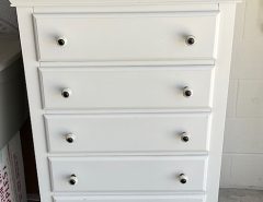 White wooden chest of drawers with 5 drawers really cute…$50. The Villages Florida