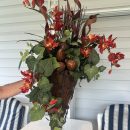 Decorative wall sconce with red flowers The Villages Florida
