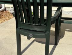 Trek outdoor table and 8 resin patio dining arm chairs The Villages Florida