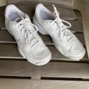 Nike real leather ladies sneakers, size 10.  Only worn twice, paid $85. Reduced price to $15. The Villages Florida