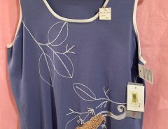 Gorgeous ladies soft knit top size 1X….price tag $53. still on.  Price $15. The Villages Florida