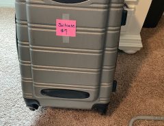 Gray rolling suitcase, carry on size, clean inside…rolls well.  $7. The Villages Florida