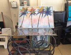 Beautiful Iron rings table w/ glass top The Villages Florida