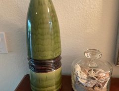 Beautiful 1 1/2 feet tall green ceramic vase ..Like New $10. The Villages Florida