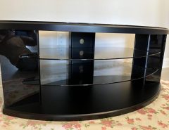 Very sturdy TV stand with 3 glass shelves. The Villages Florida