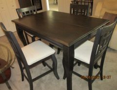 Wood counter height table with sleeve, and 4 wood chairs The Villages Florida