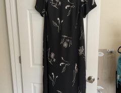 size 16 Long black dressy dress with small white floral design…like new $20. The Villages Florida