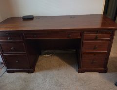 Large solid wooden desk with lots of drawers….$100. The Villages Florida